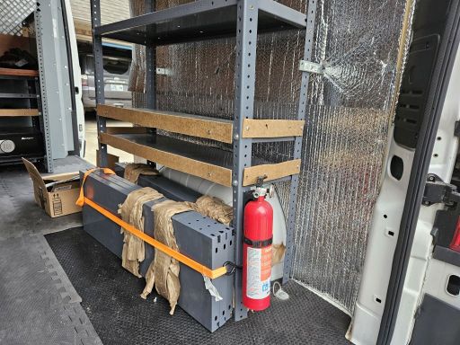 2016 Promaster 1500 136WB Cargo Bay Showing Shelves and Fire Extinguisher
